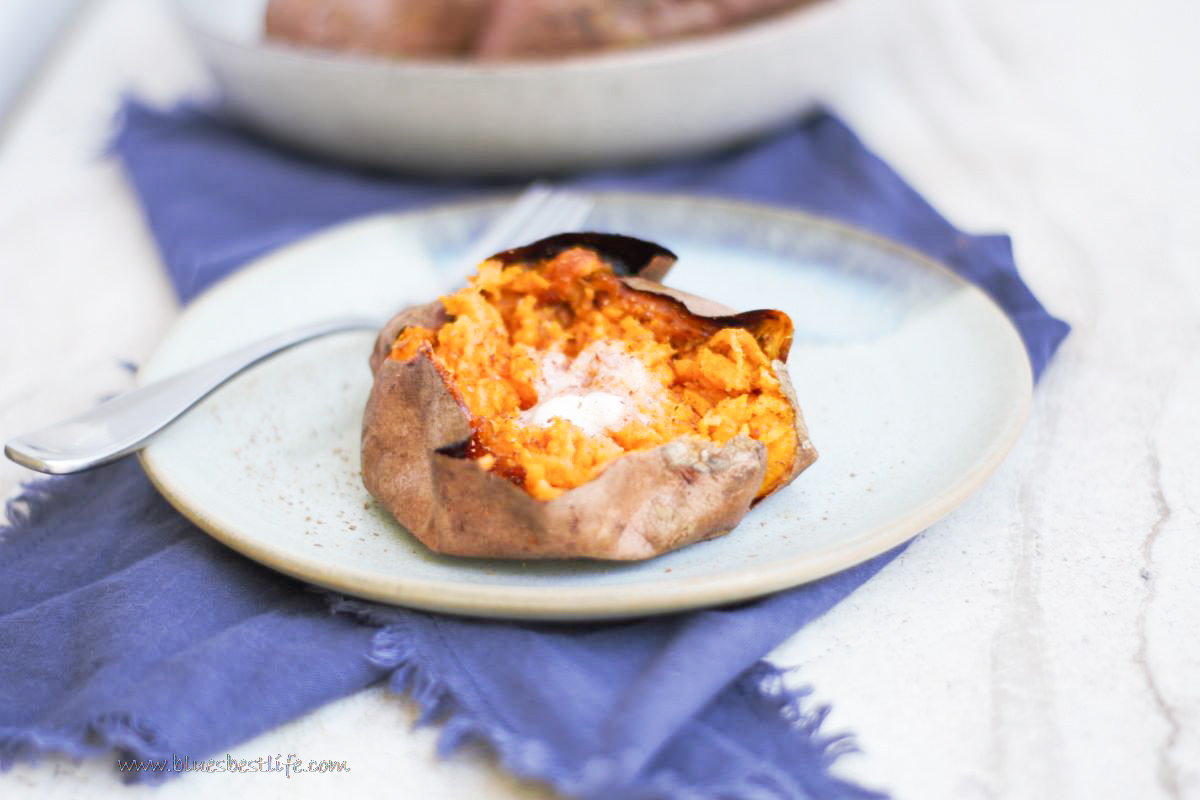 a air fryer baked sweet potato with butter and cinnamon