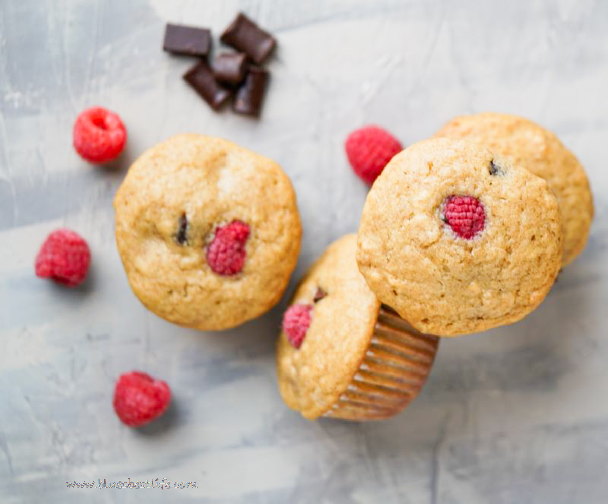 raspberry chocolate chip muffins on a counter