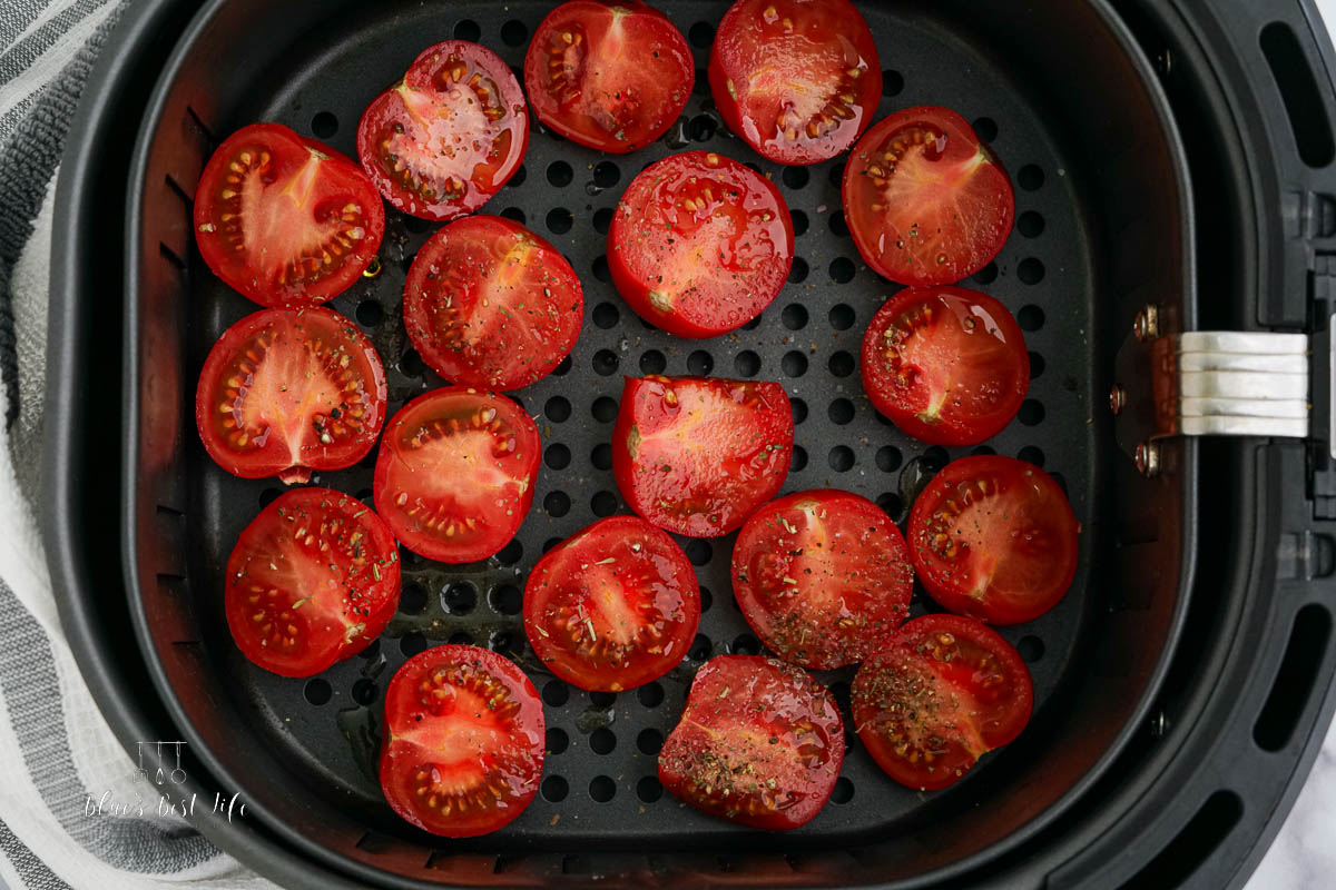 the tomatoes in the air fryer basket