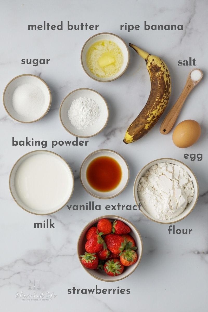 The ingredients to make strawberry banana pancakes. 