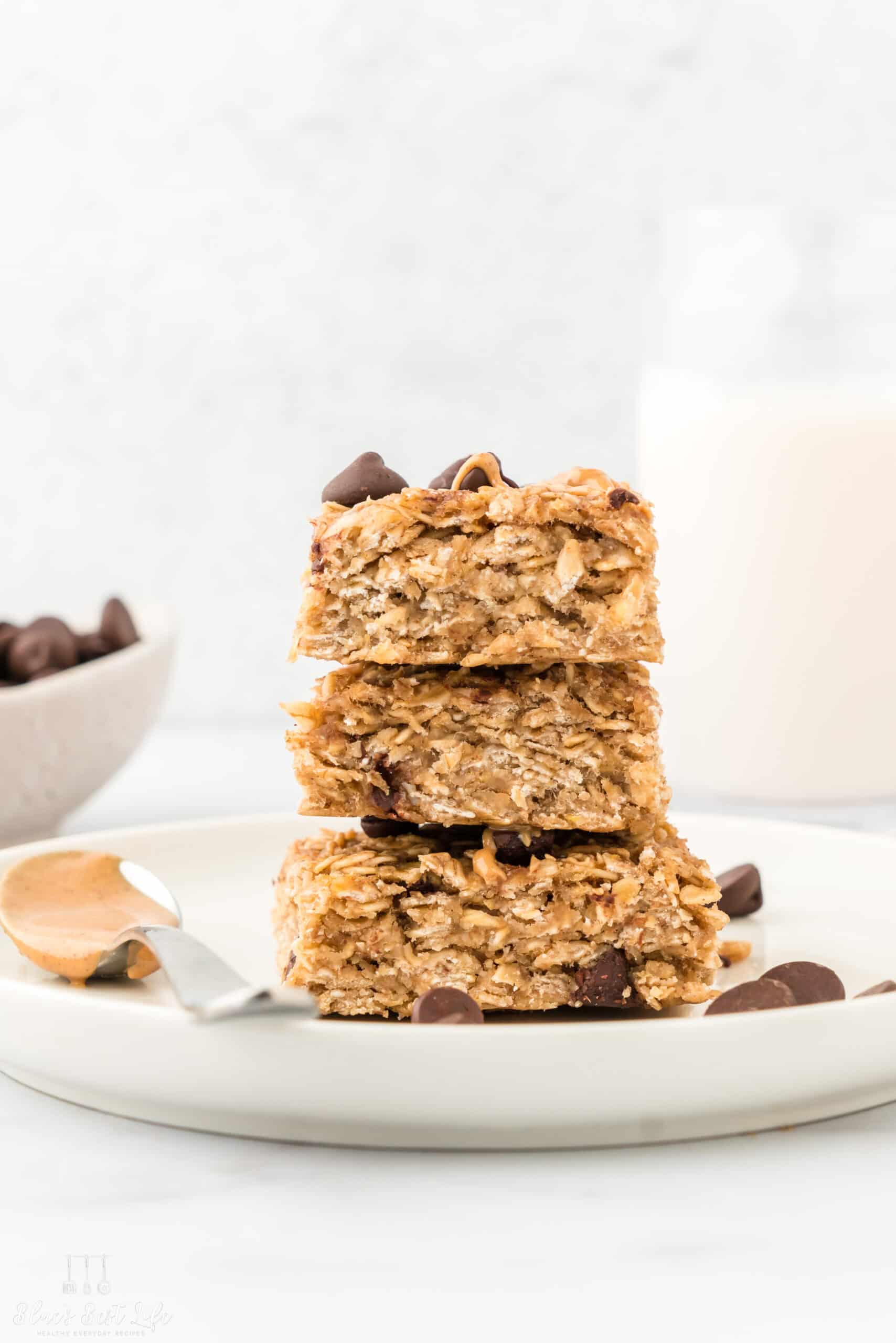 A stack of oatmeal bars on a plate.