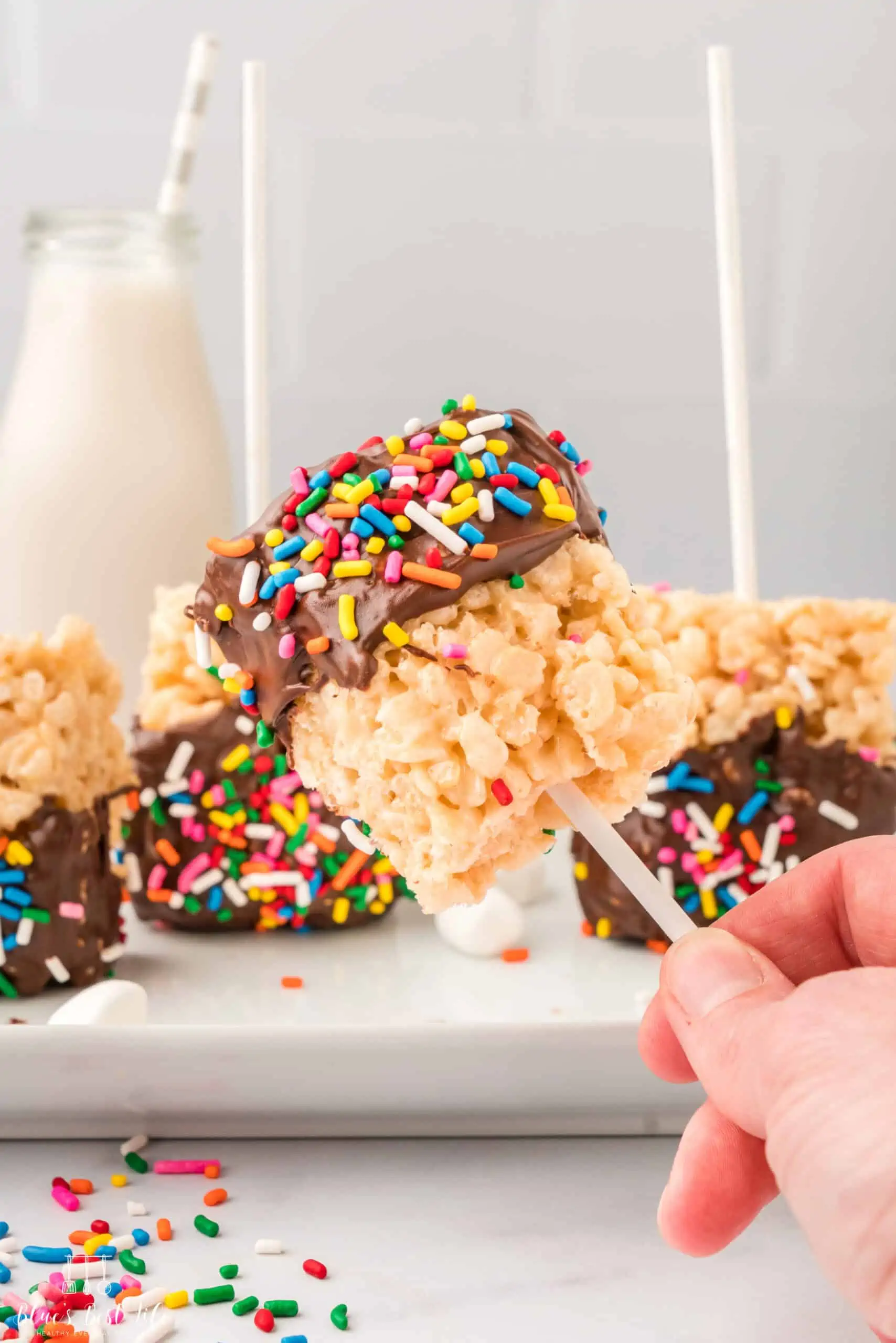 Chocolate covered rice Krispies on a lollipop stick. 