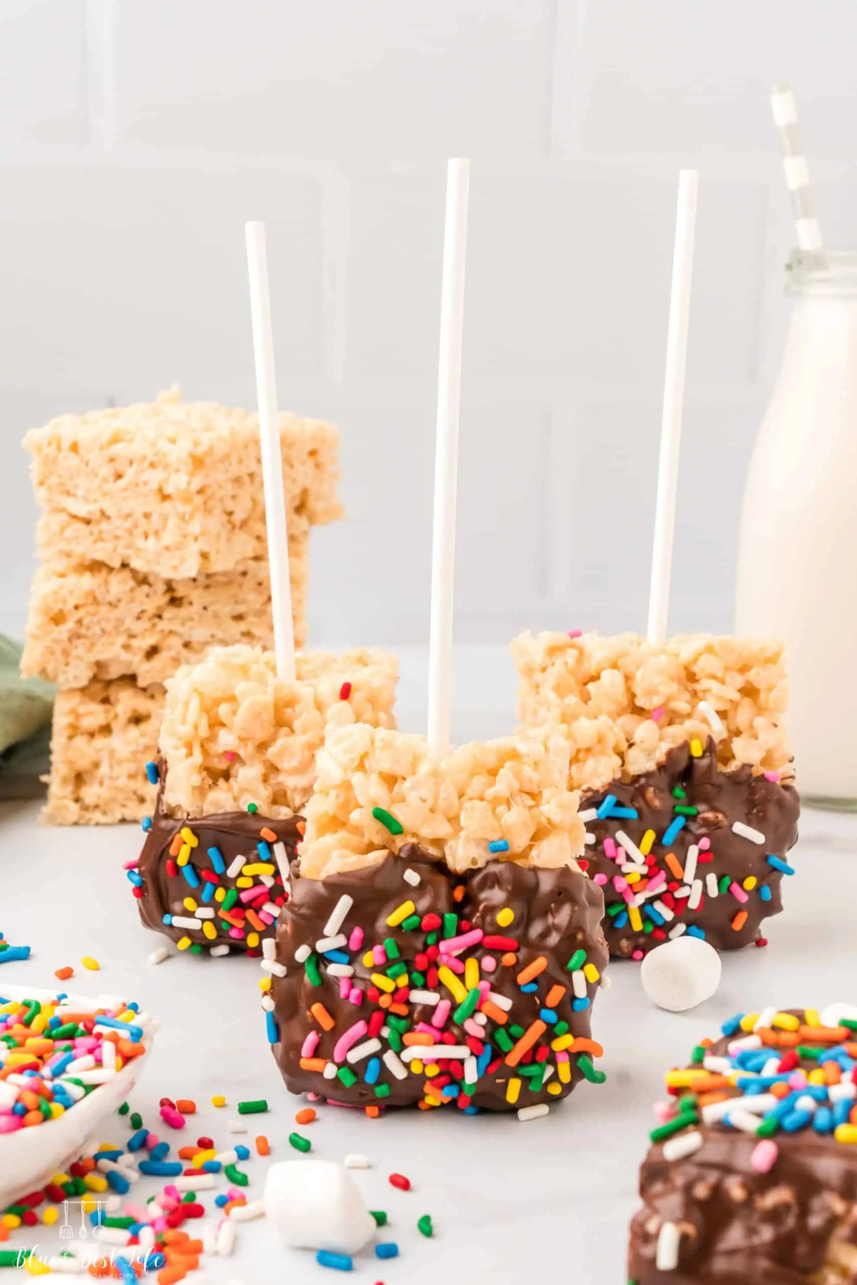 Rice Krispies covered in chocolate and sprinkles. 