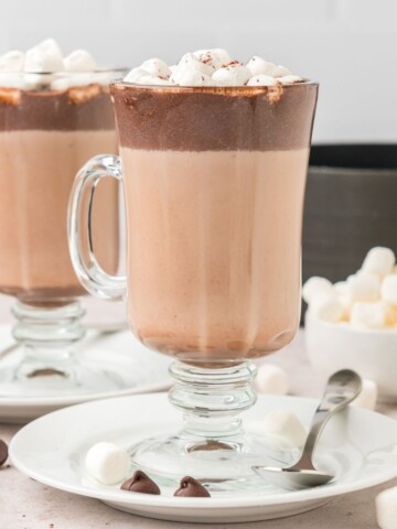 Mugs of hot chocolate with marshmallows.
