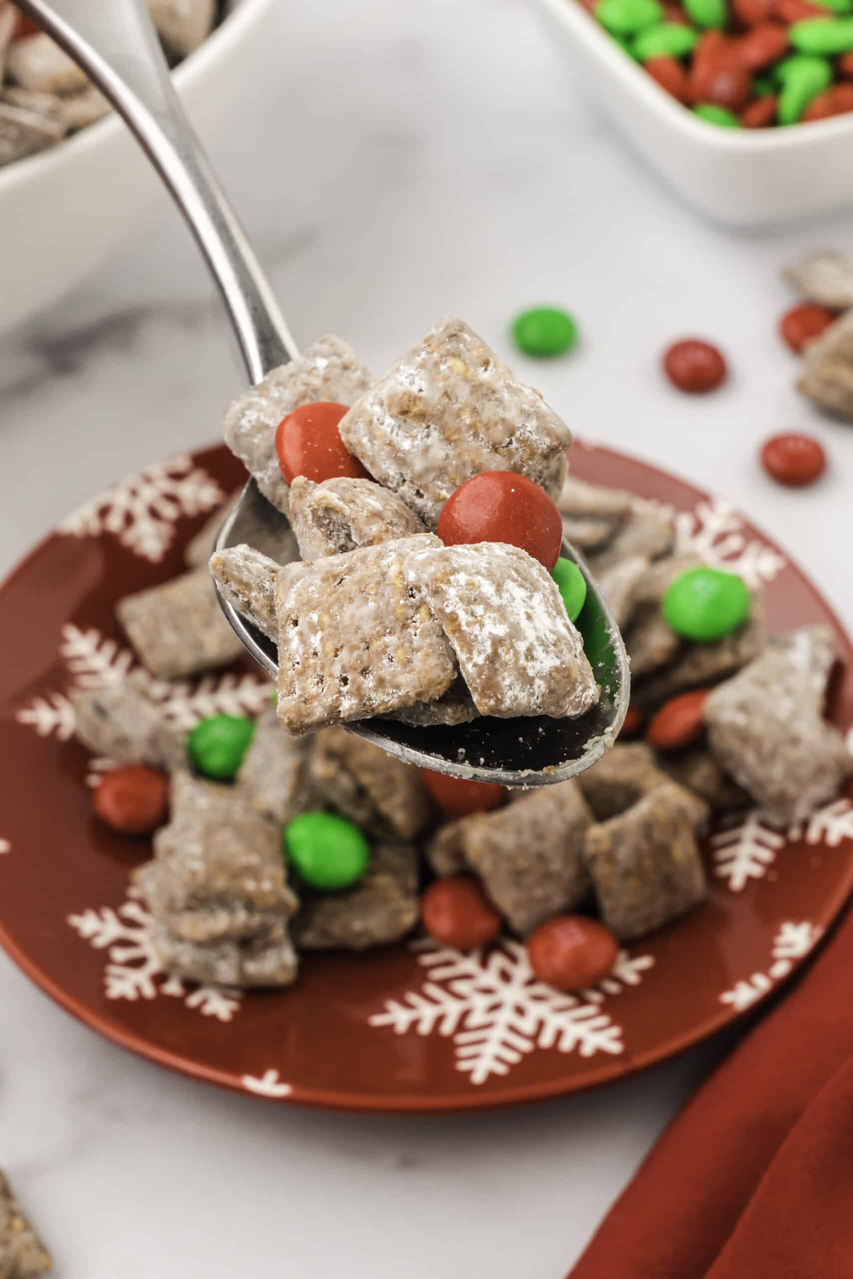 A spoonful of Christmas Muddy Buddies. 