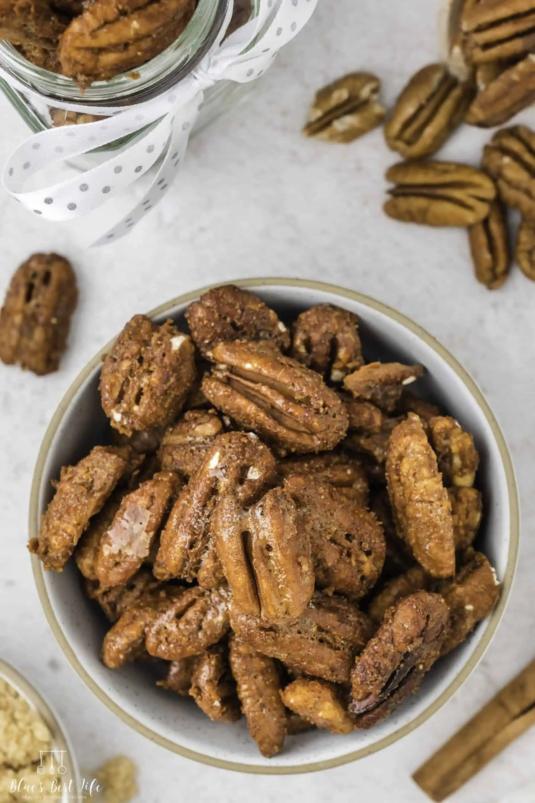 A bowl of candied pecans. 