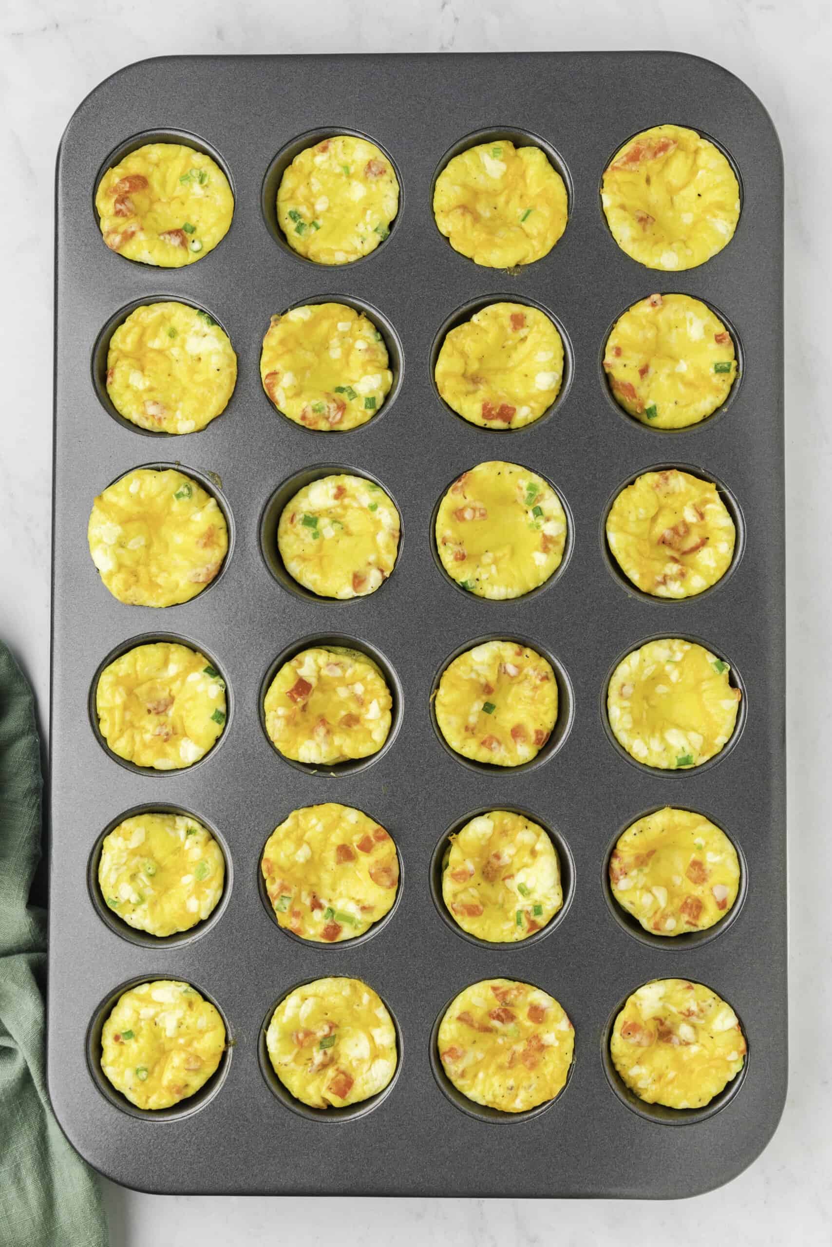 Baked egg bites in a muffin tin.