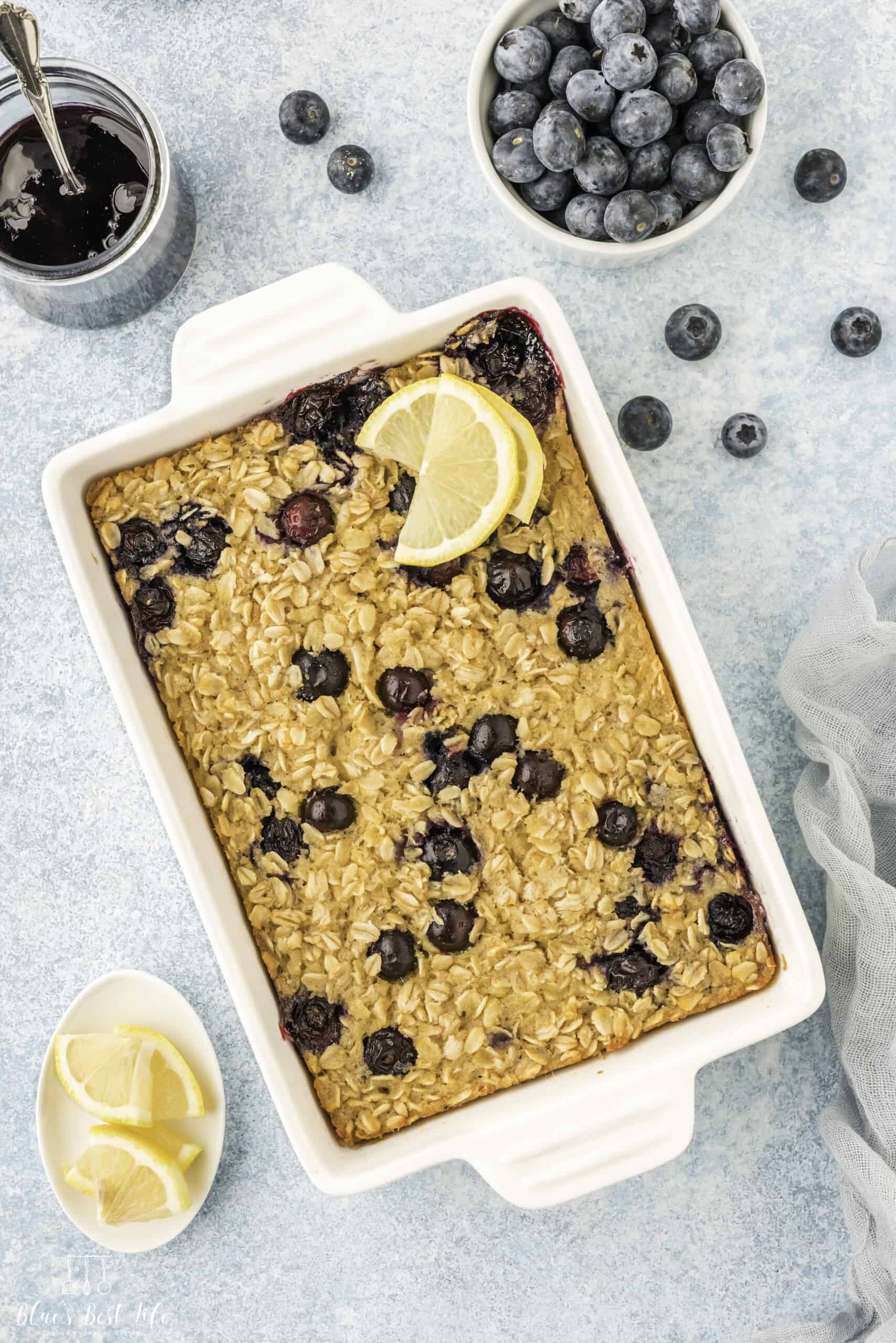 A baking dish with lemon blueberry baked oats.