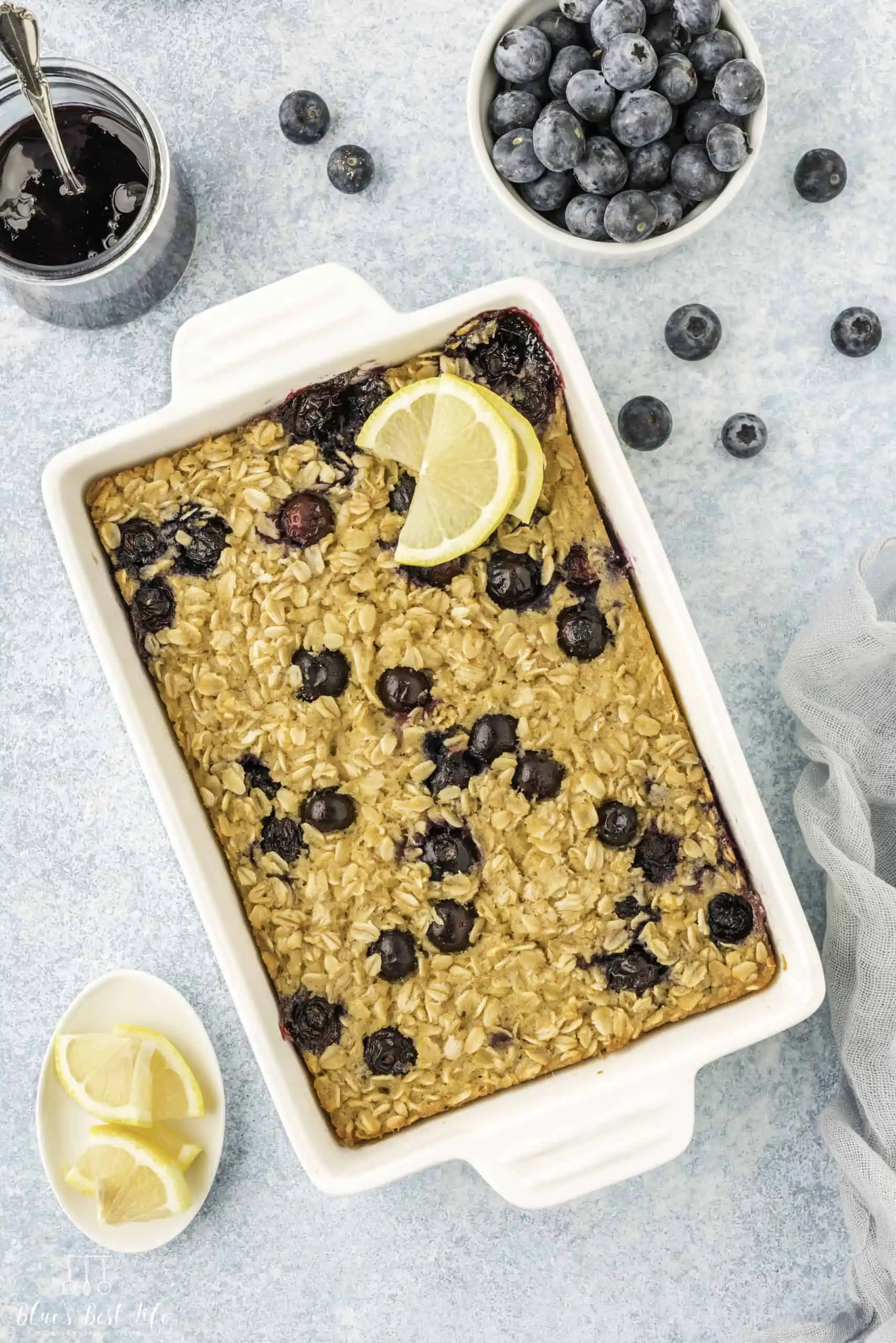 A baking dish with lemon blueberry baked oats. 
