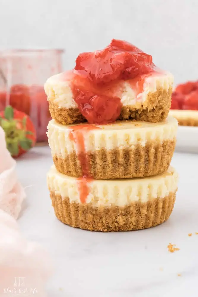 A stack of mini strawberry cheesecakes.