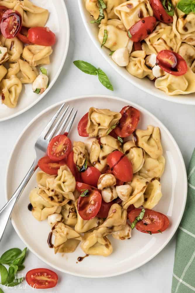 A plate of tortellini salad. 