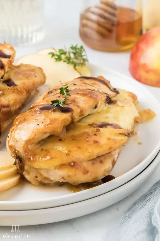 A chicken breast stuffed with brie and apple slices.  