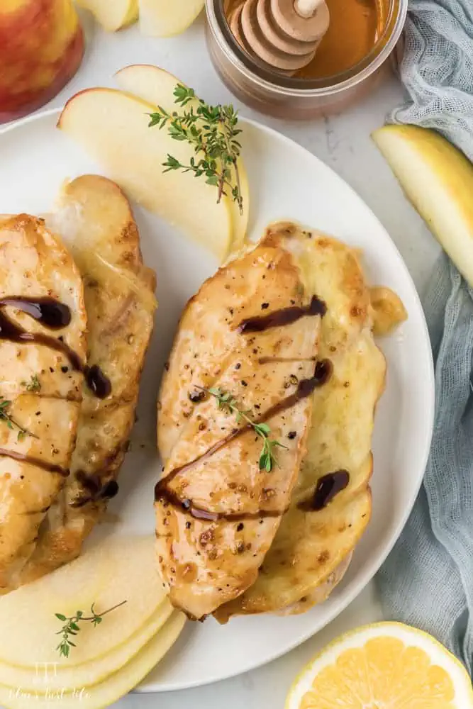 Brie and apple stuffed chicken on a plate. 