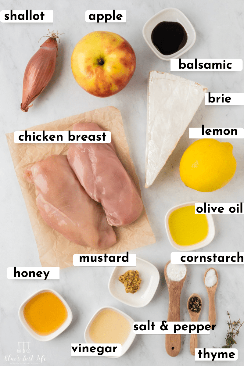 Ingredients needed for apple brie stuffed chicken. Such as: Shallot, apple, balsamic, chicken breast, mustard, lemon, olive oil, cornstarch, salt & pepper, thyme, honey, vinegar. 