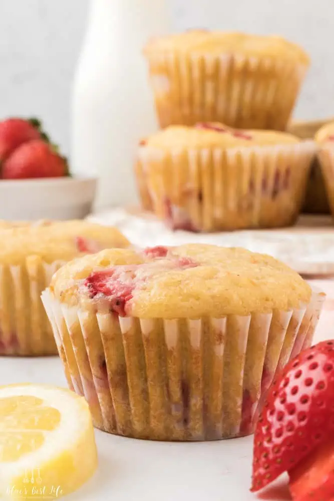A close up of a strawberry lemon muffin. 