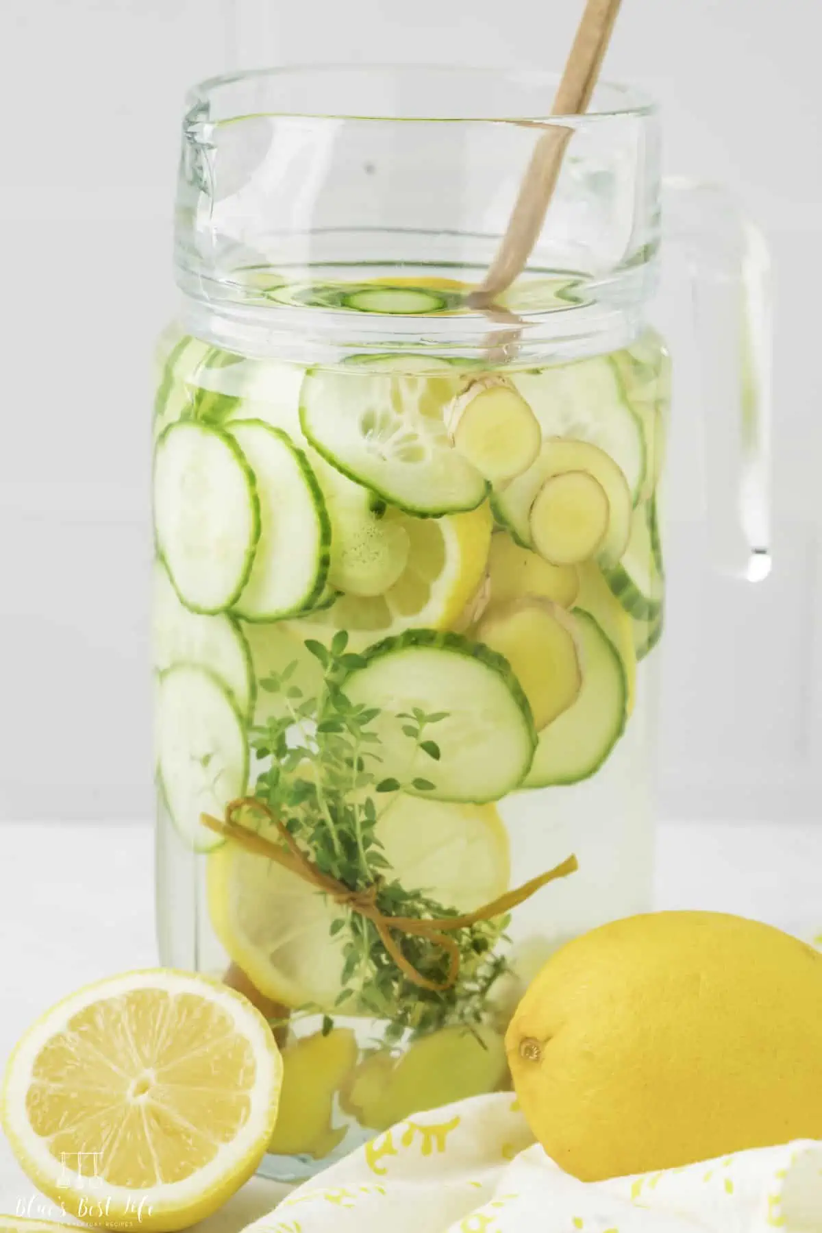 A pitcher of cucumber lemon ginger water. 