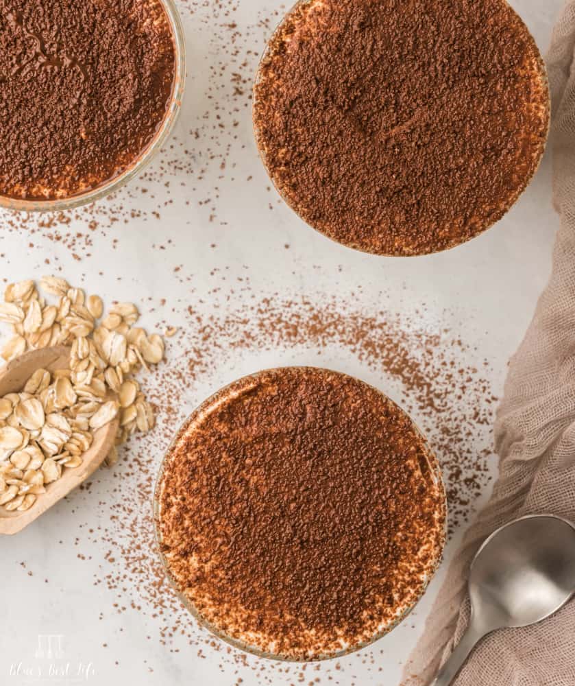 An overhead of three servings of  tiramisu overnight oats. 