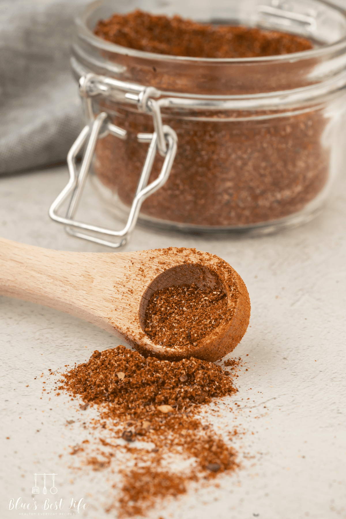 The spice mixture on a small measuring spoon.