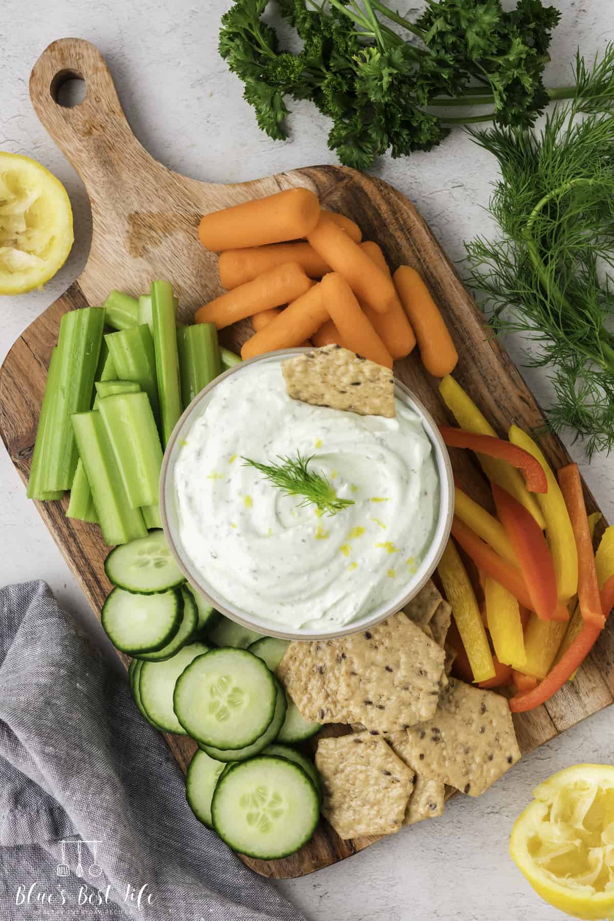 Cottage cheese dip with veggies and crackers. 