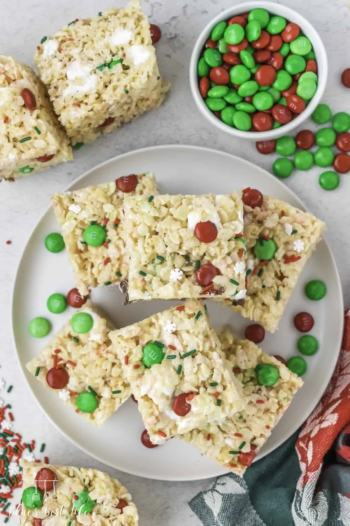 A plate with Christmas rice Krispie Treats. 