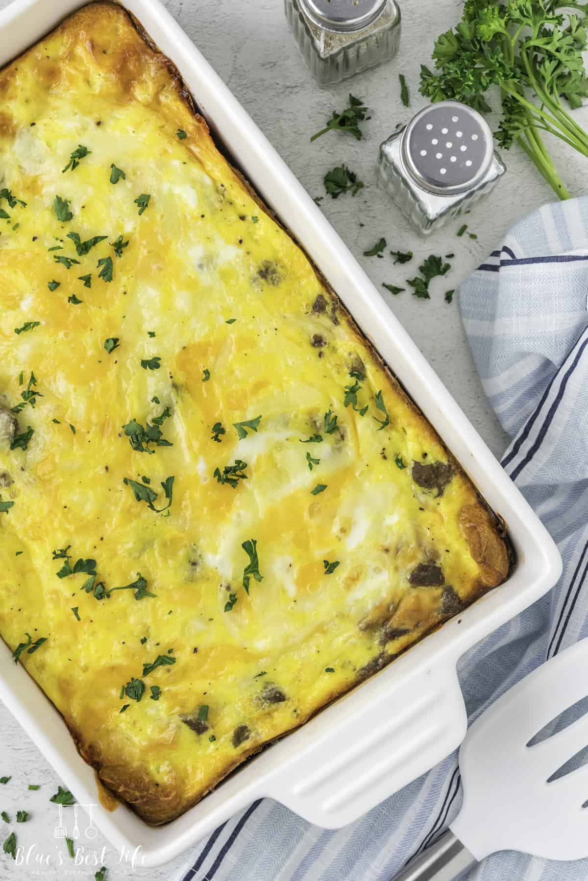 Easy Crescent Roll Breakfast Casserole With Sausage in a casserole dish. 