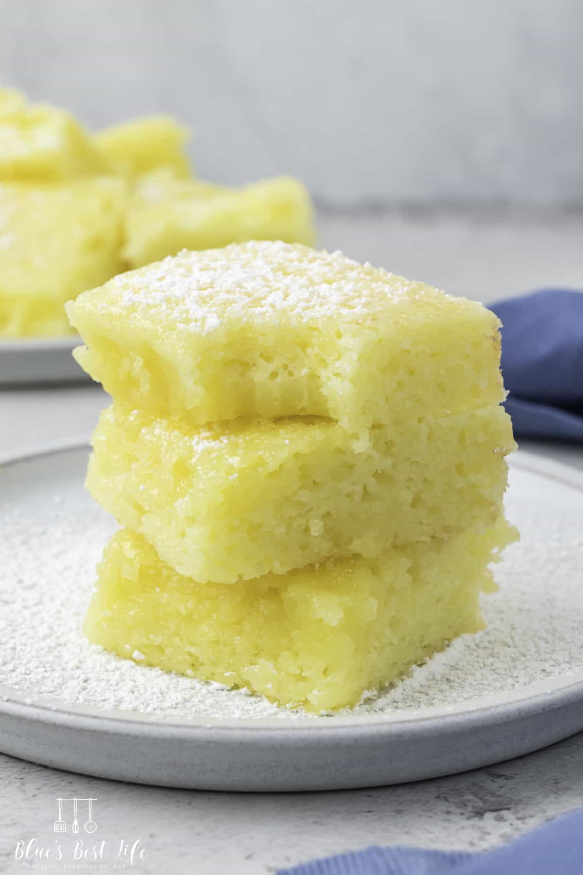 The bars cut and dusted with powdered sugar.