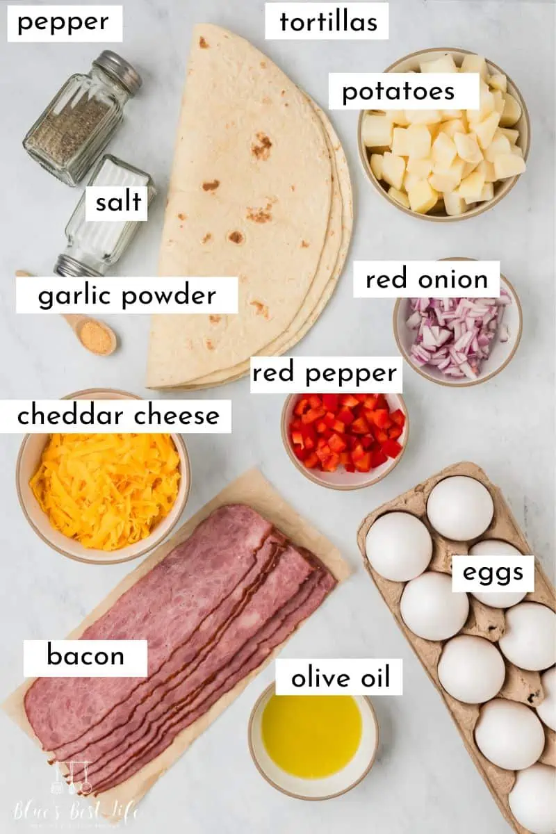 The ingredients to make breakfast burritos. 