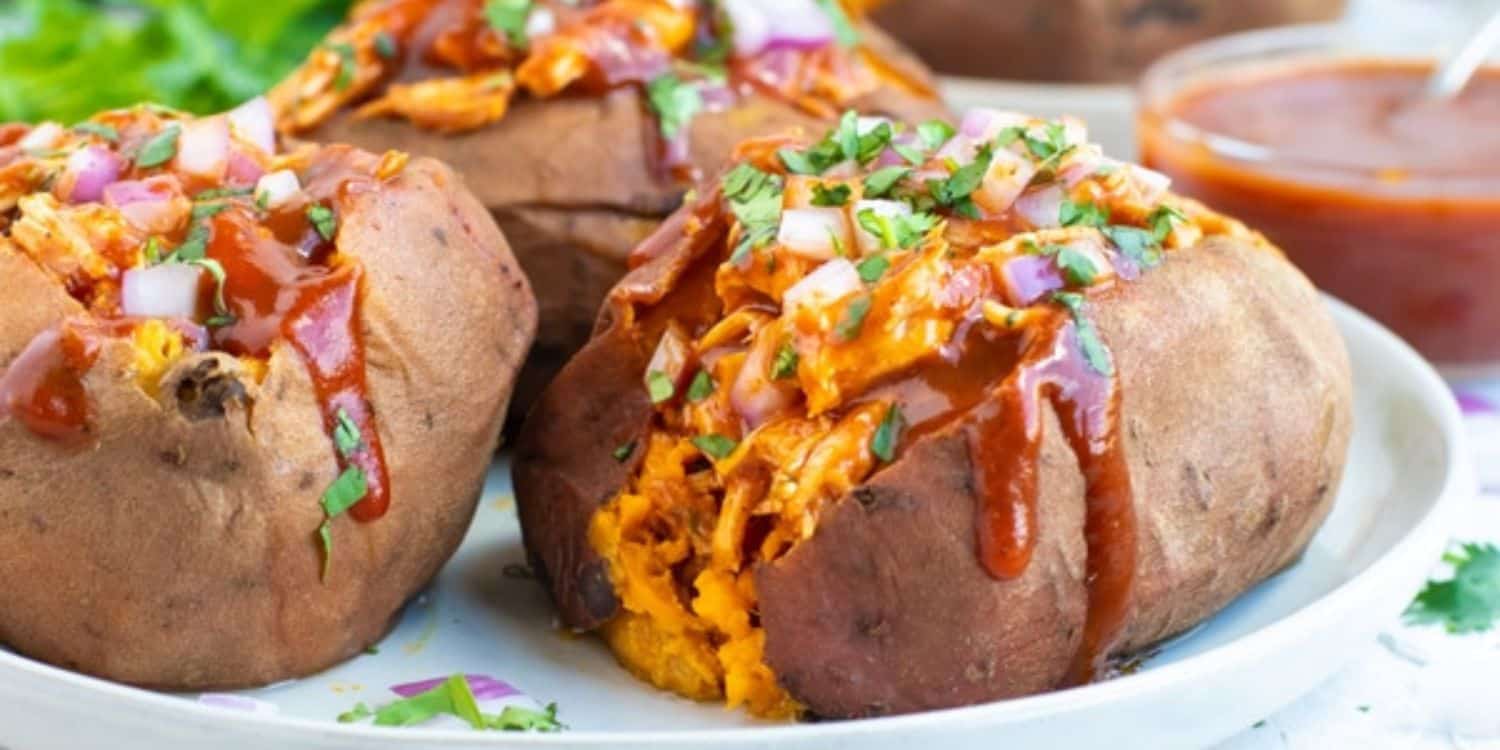 BBQ Chicken Stuffed Sweet Potatoes served on a plate. 