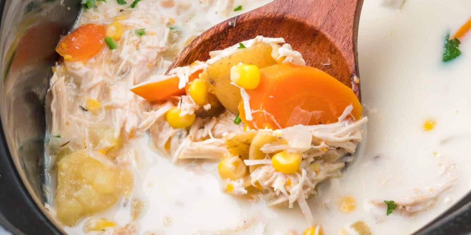 Close-up shot of chicken and corn soup. 