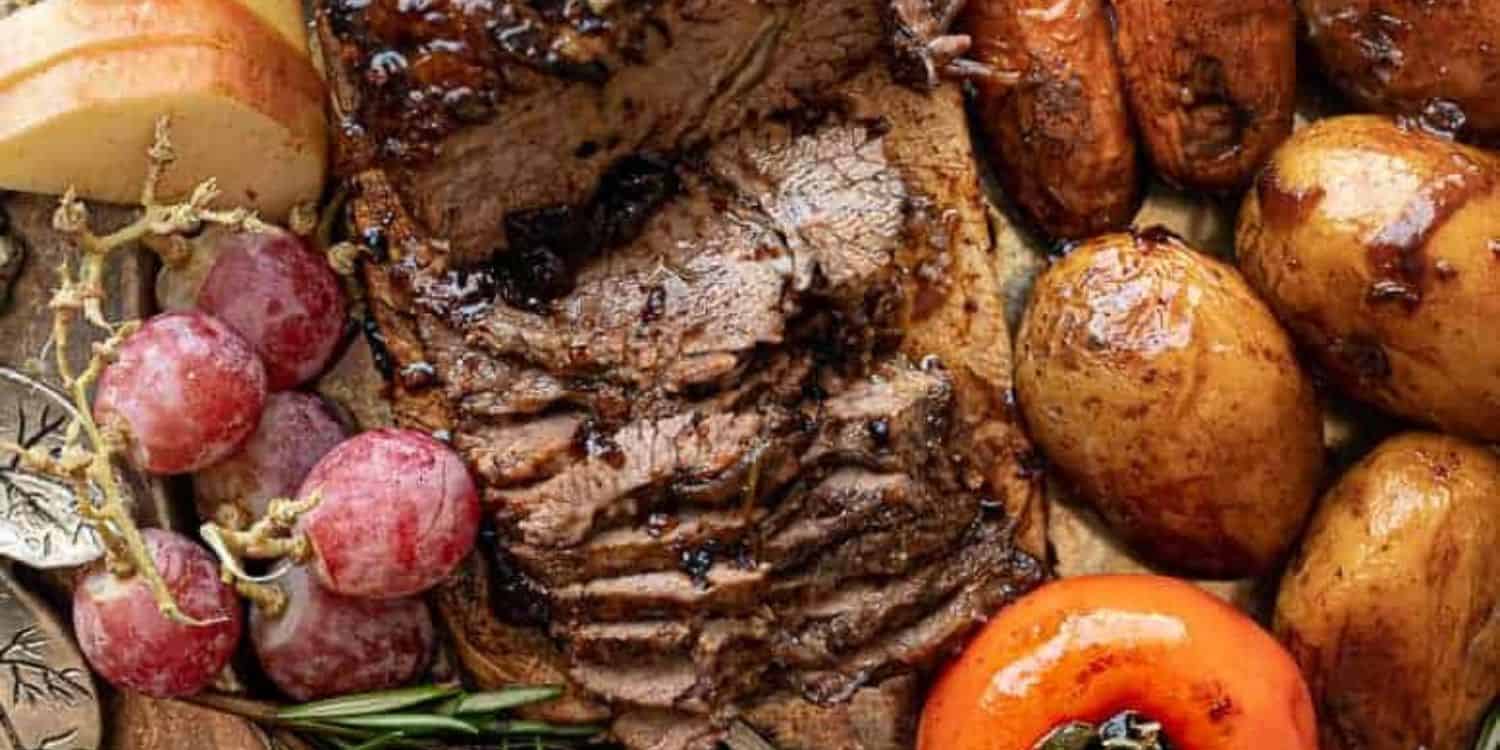A close-up shot of Apple Cider Brisket with potatoes. 