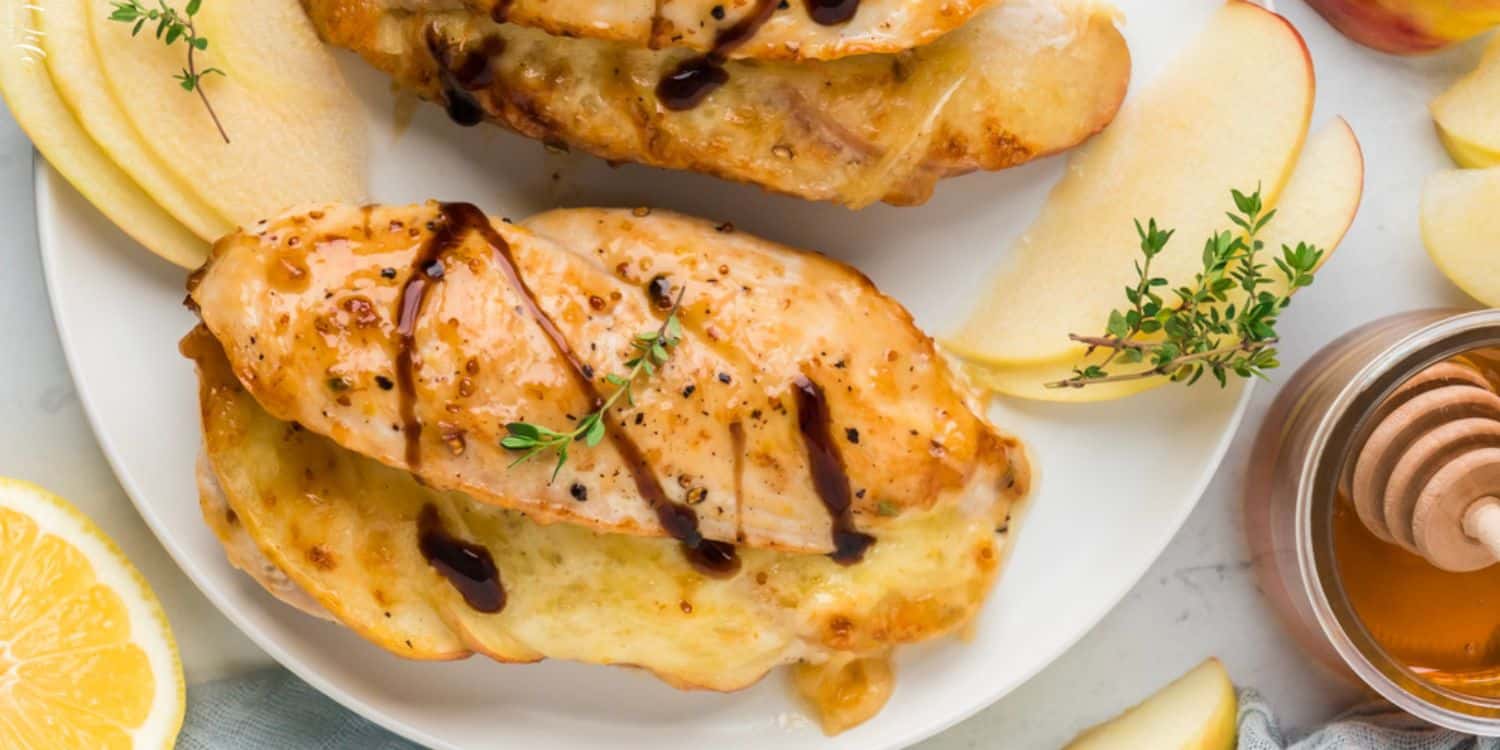 A close-up shot of Apple Brie Stuffed Chicken served on a plate. 
