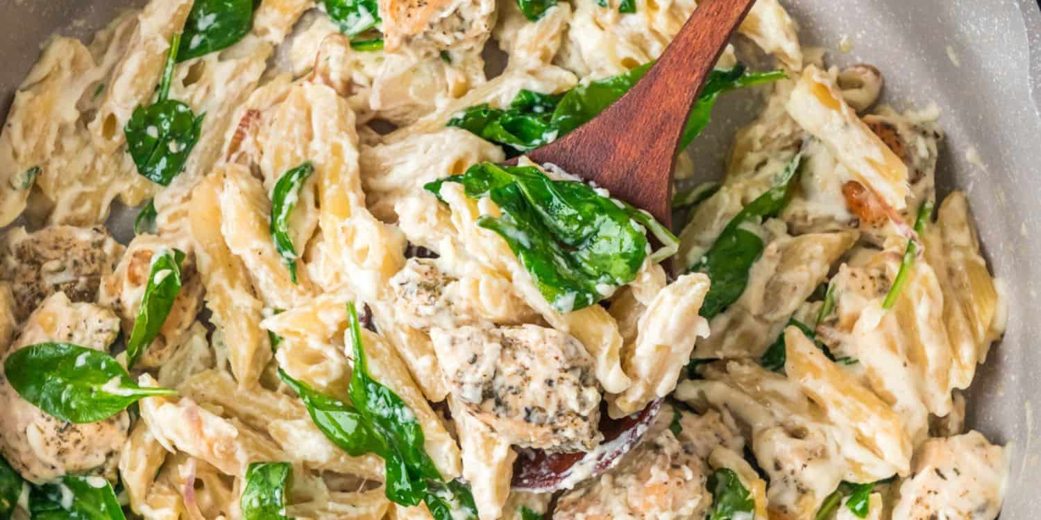 Close-up shot of Parmesan Chicken Spinach Pasta. 
