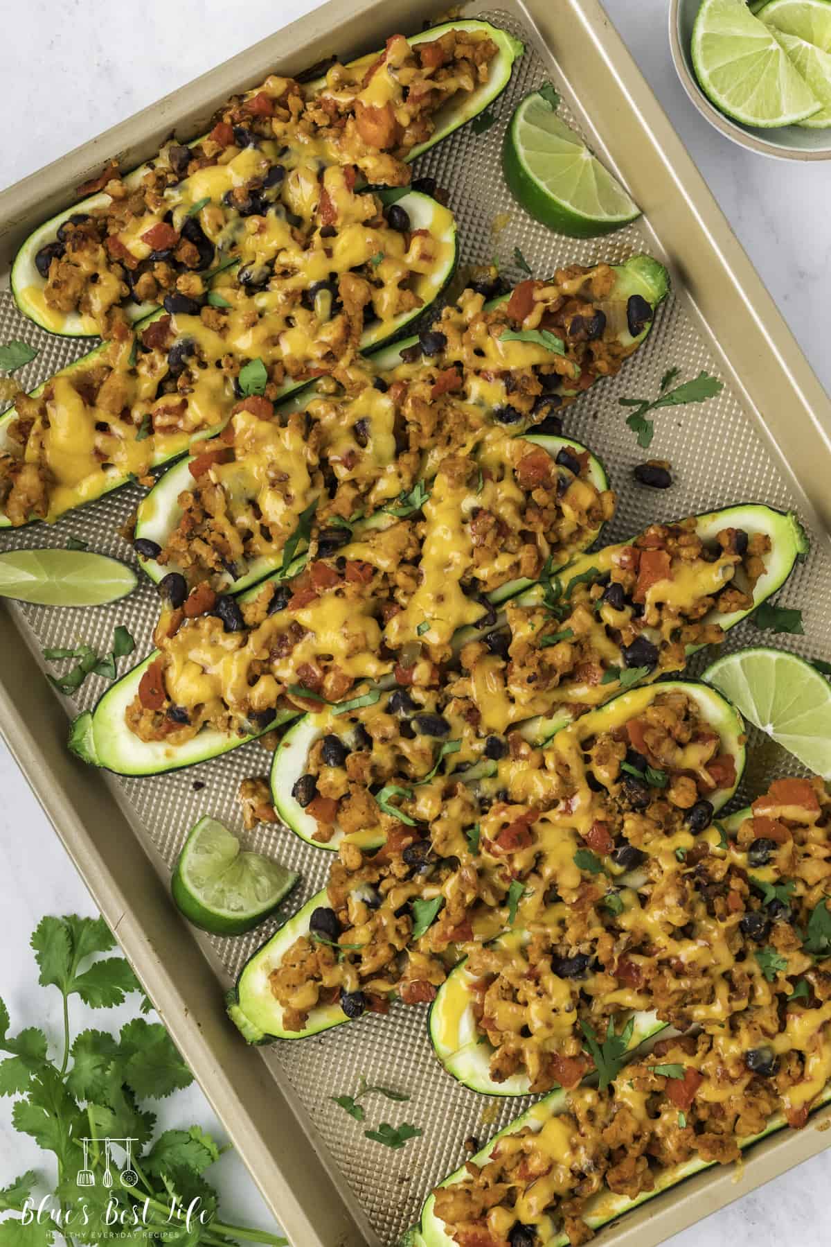 Zucchini Stuffed Taco Boats on a baking tray.