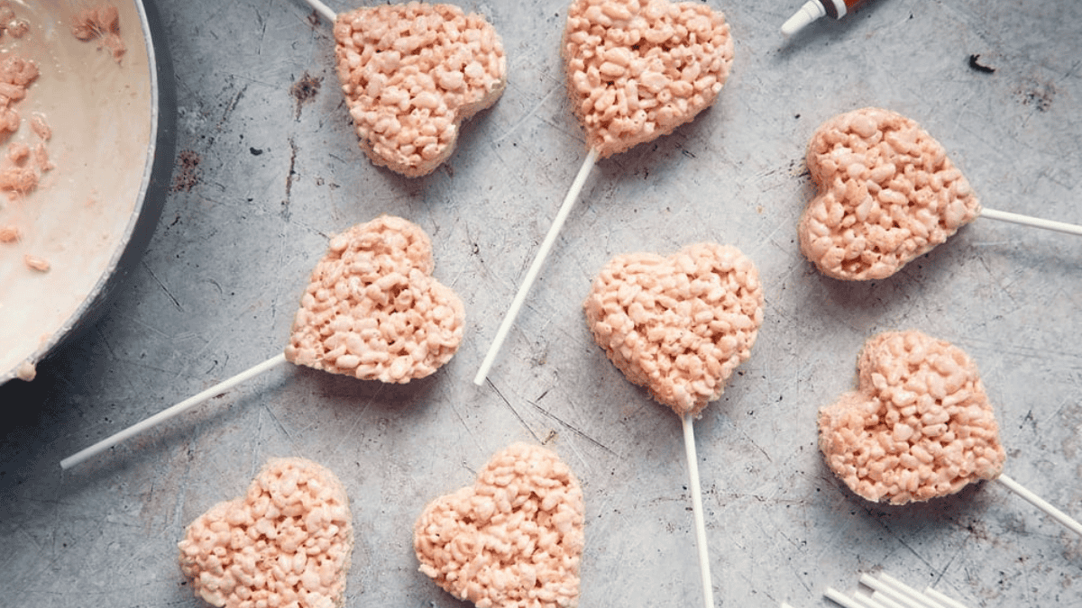 heart shaped Pink Heart Crispy Cake Pops on sticks