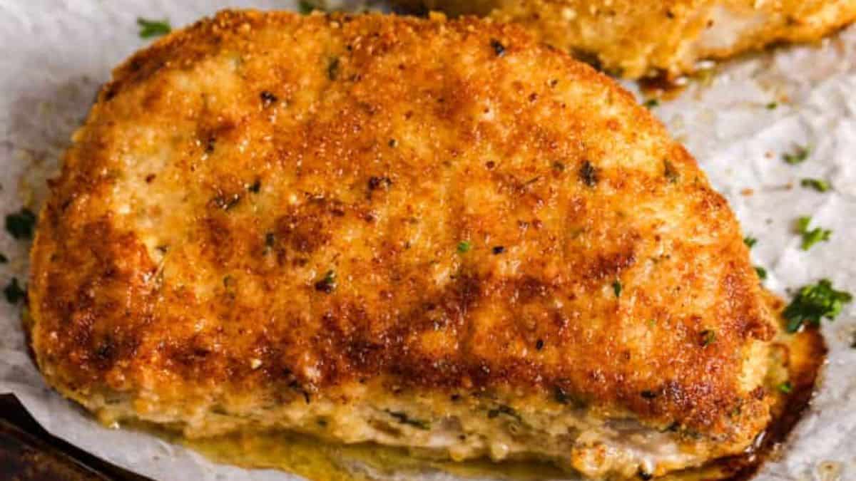 breaded pork chop on a plate