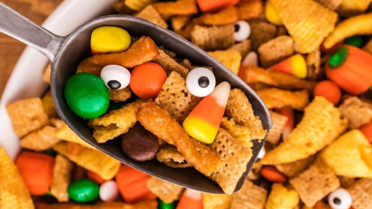 snack mix with chex mix, candy corn, edible eyes, and candy