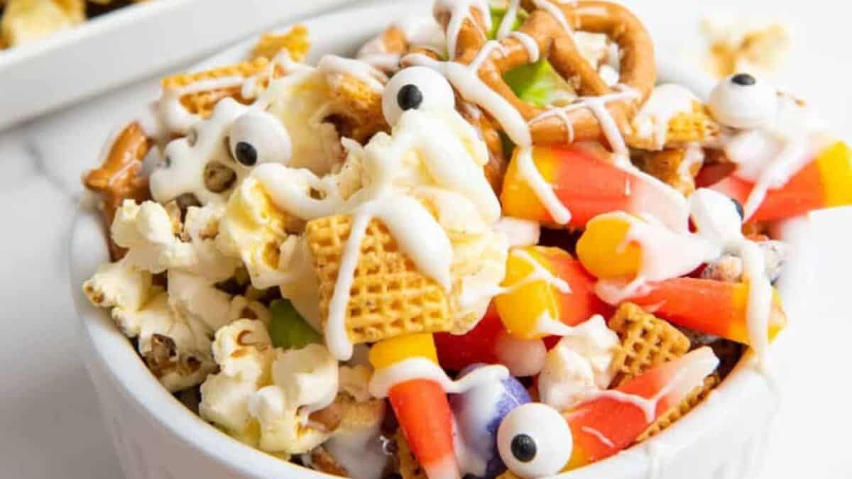 snack mix with popcorn, cereal, candy, caramel, edible eyes