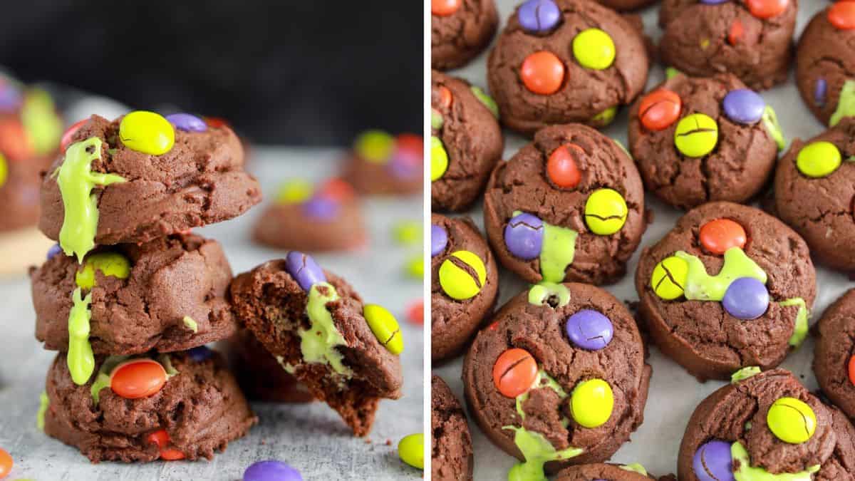 circular chubby chocolate cookies decorated each with yellow, orange, and purple M&M
