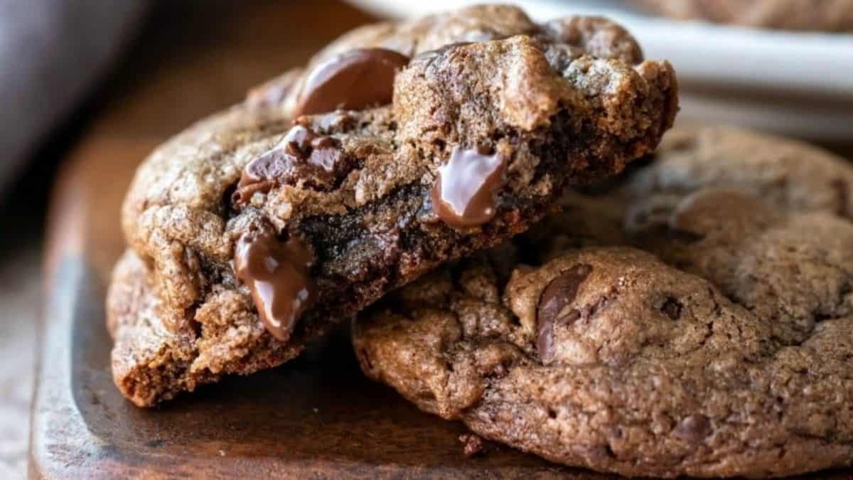 two mint chocolate chip cookies with melting chocolate