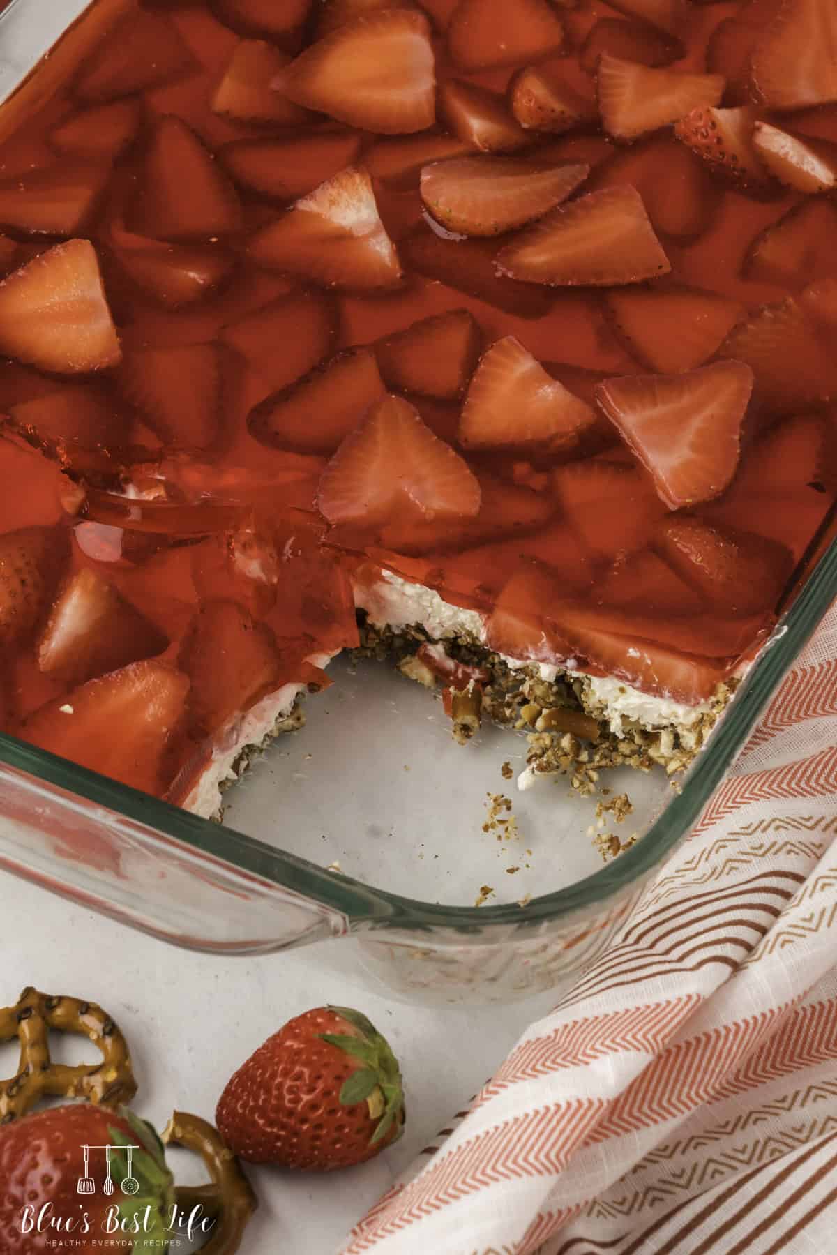 closer look of the Strawberry Pretzel Salad with a missing slice.