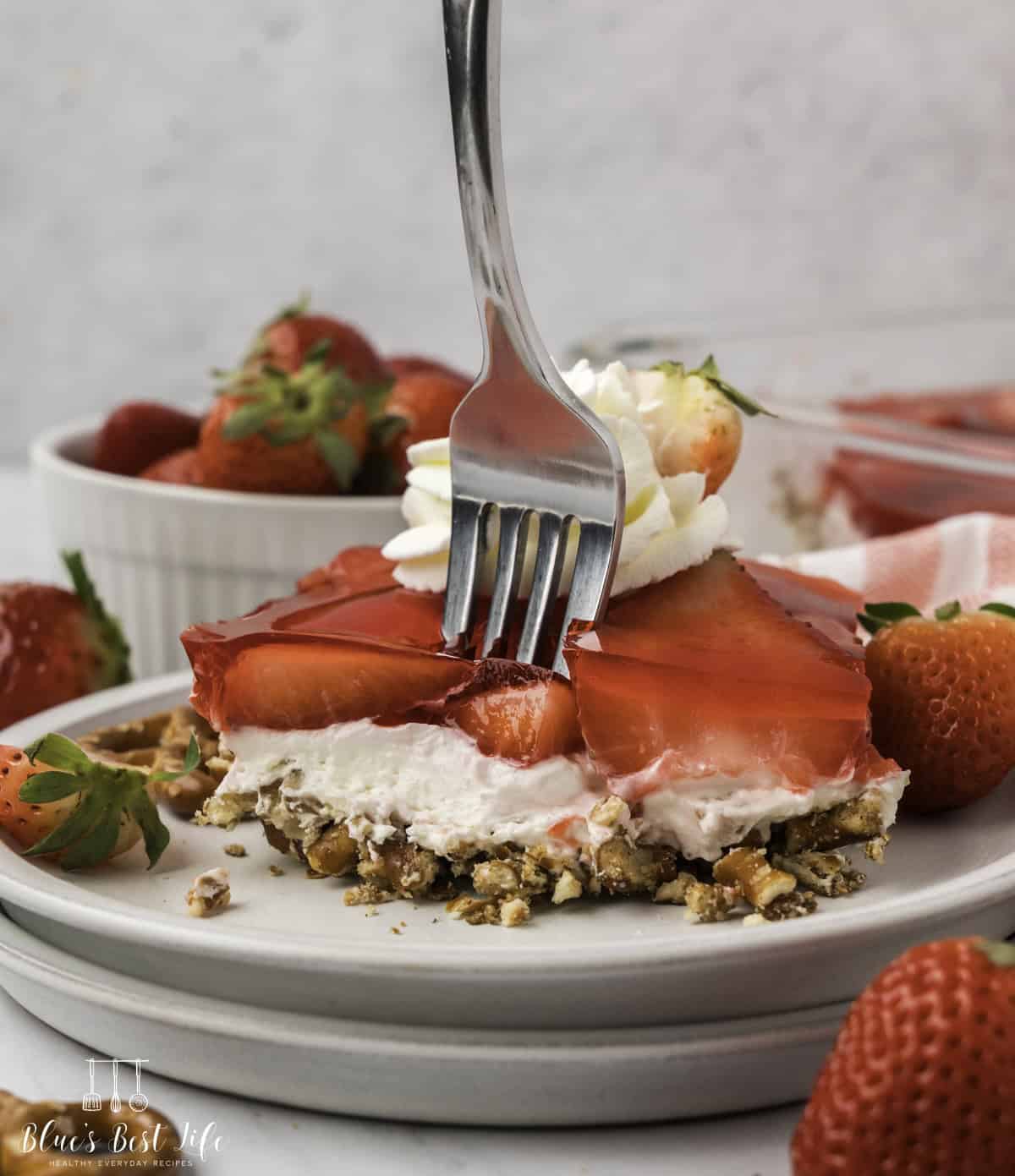 Fork stick onto Strawberry Pretzel Salad