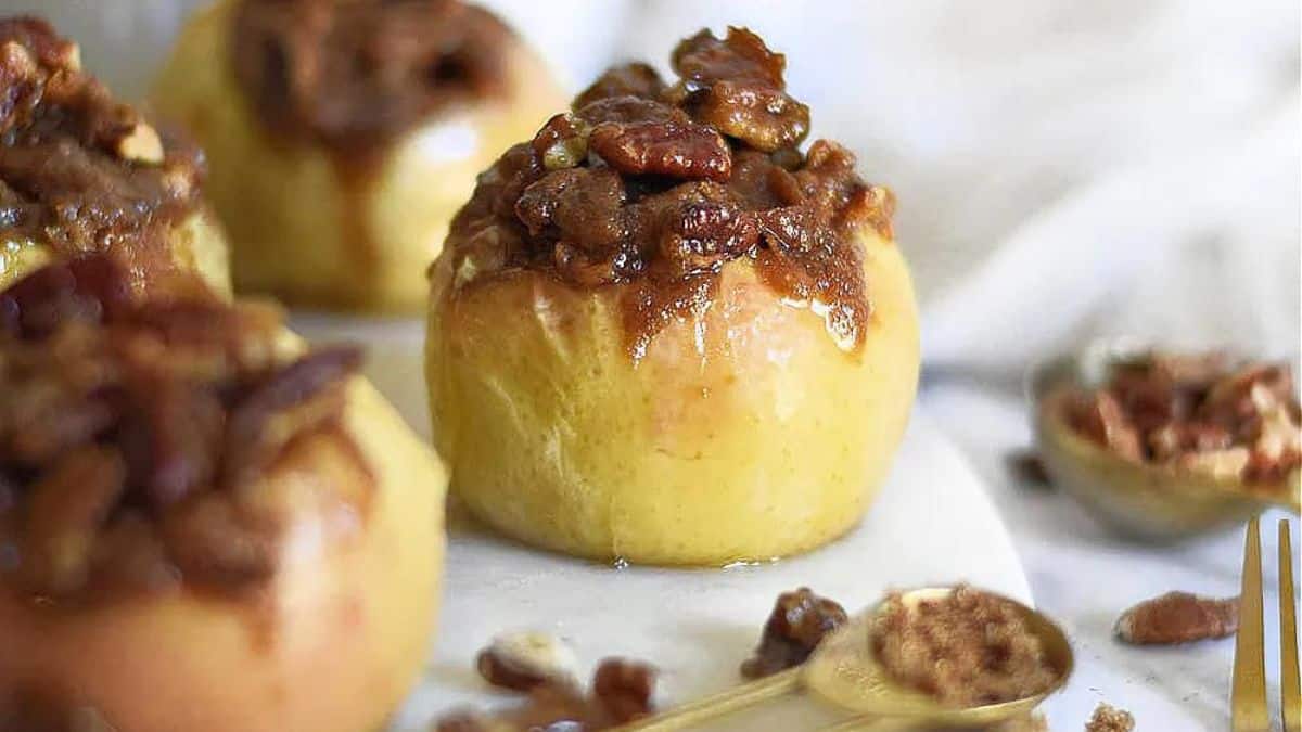 baked apple loaded with a mix of pecans and brown sugar
