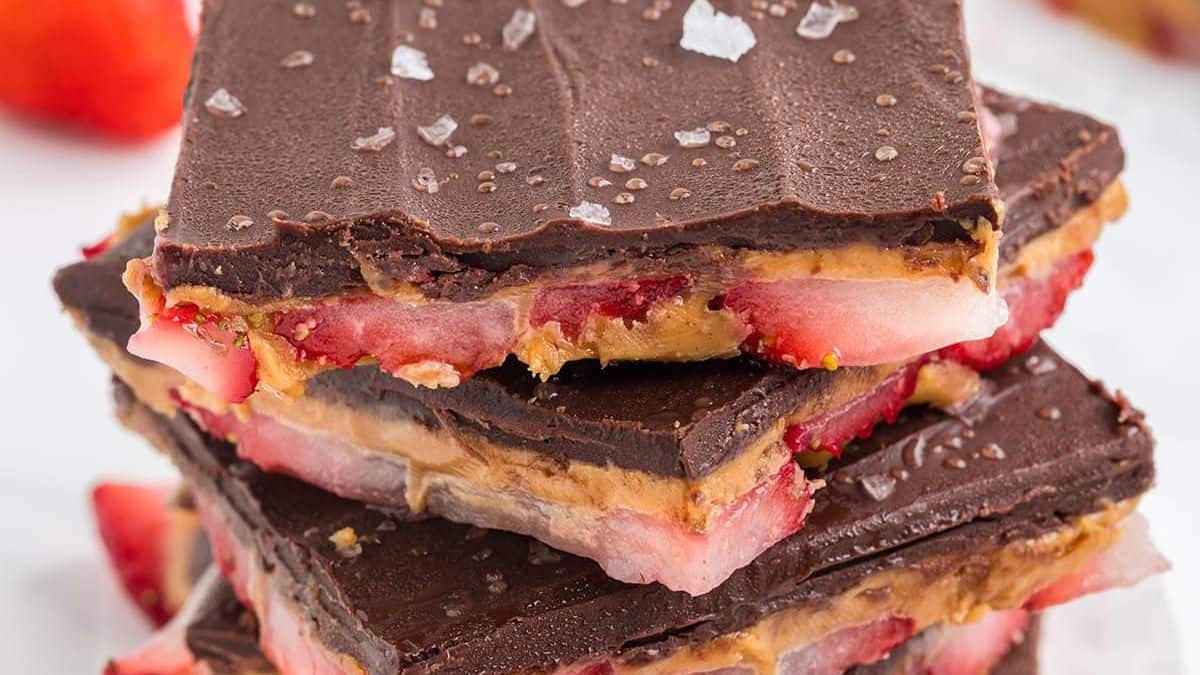peanut butter and chocolate bark with a layer of fresh strawberries
