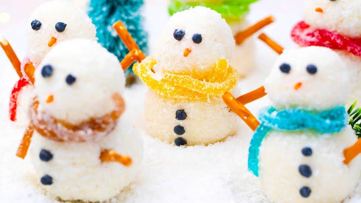 truffles made with two balls and decorated like mini snowmen