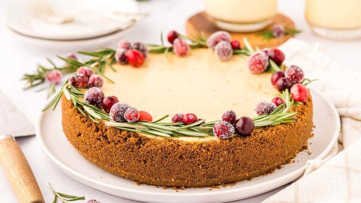 A side angle shot of an Eggnog Cheesecake.