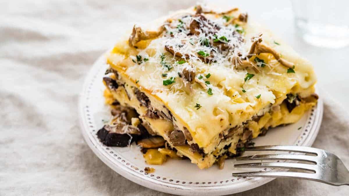a plate with a portion of mushroom lasagna