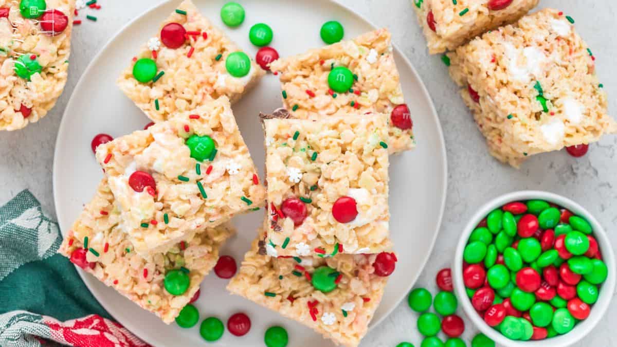 rice krispie treats with red and green M&M on a plate
