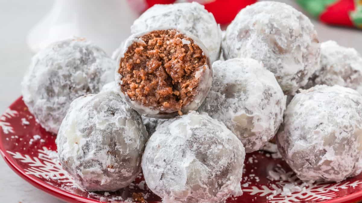 several rum balls on a christmas platter