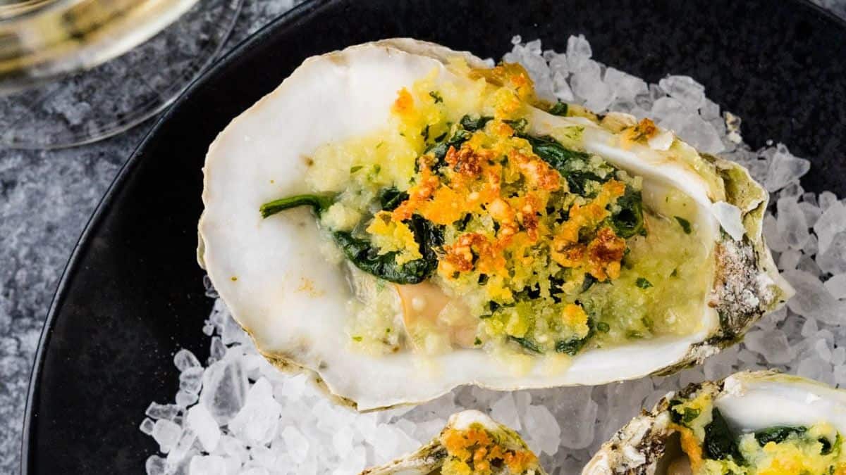 an oyster with crunchy topping and sauce