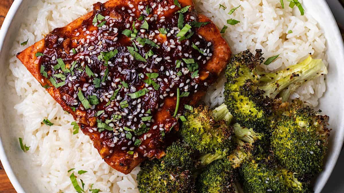 Gorgeously plated chili maple salmon and broccoli bowls.